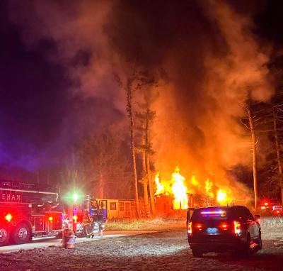 Firefighters contained the blaze in about 30 minutes, preventing serious damage to any neighboring homes. Photo by Claudine Marie Bolduc