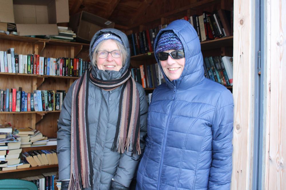 Even in the blistering cold,  Amanda Cobb and Jennifer Gady still show up. Photos by Brandy Muz
