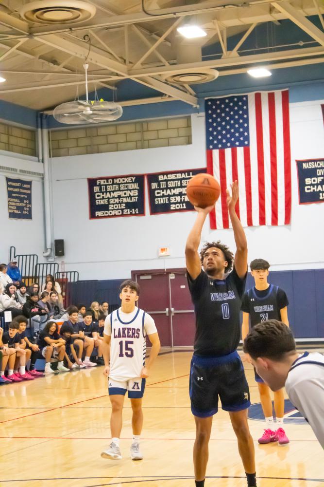 Amare Rose goes for the free throw. Photos by Brandy Muz