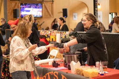 Bella Shephard of Arts BBQ in Middleboro dishes out some chili in 2025. File photo