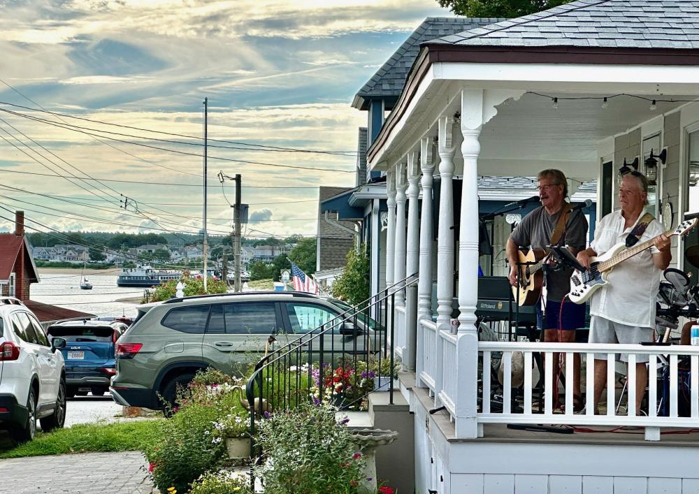 A band performs from a porch for the second trial run of Porchfest in Onset on Sunday, Aug. 2. Source: Todd Holden