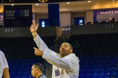 Head Coach Steve Faniel directs his players.