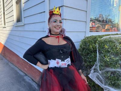 Jennifer Godfrey poses in her Queen of Hearts costume, complete with a collar and belt she made out of playing cards. 