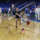 Malikhi Tavares goes for a last second shot.