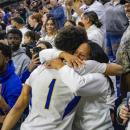 Aaron Cote celebrates with family.