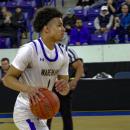 Aaron Cote makes a move toward the basket.