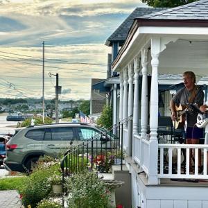 A band performs from a porch for the second trial run of Porchfest in Onset on Sunday, Aug. 2. Source: Todd Holden