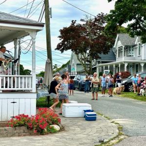 Neighbors dance to the music ringing out in the street. Source: Todd Holden