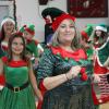 Elizabeth Wingert leads the elf parade. Photos by Brandy Muz