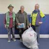 Hilary Greene, Jo-Ann Finn and Amanda Cobb with the collected bag of plastics. Photos by Kat Sheridan